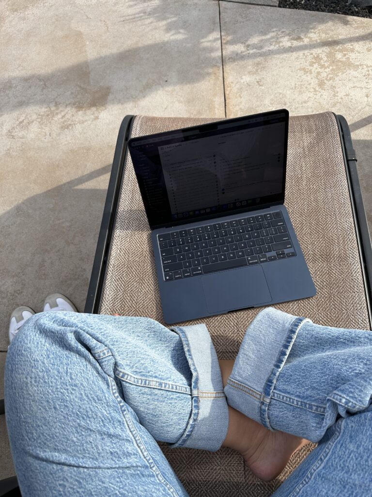 Women outside with laptop | Ct Digital